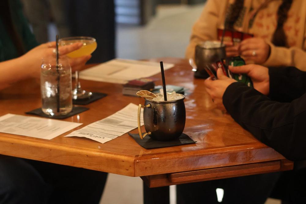 A table mid-game with drinks
