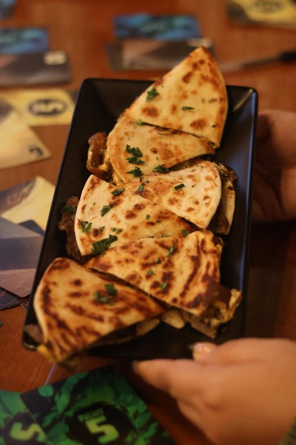 Quesadilla wedges served at a game table