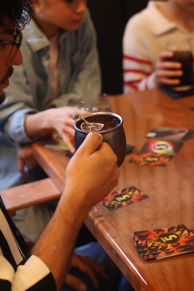 A warm drink during a card game