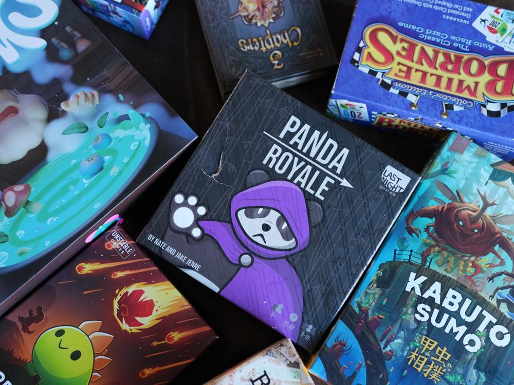 A spread of board game boxes